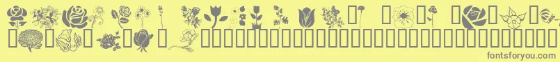 Wmflowers1-Schriftart – Graue Schriften auf gelbem Hintergrund