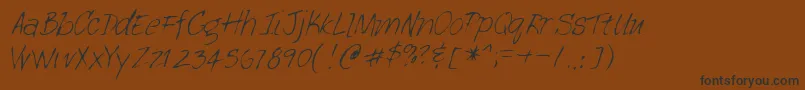 フォントLehn113 – 黒い文字が茶色の背景にあります