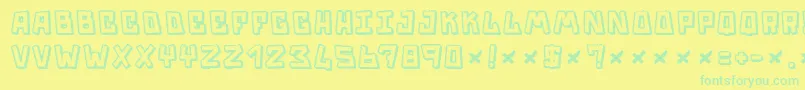 Trouble Font – Green Fonts on Yellow Background