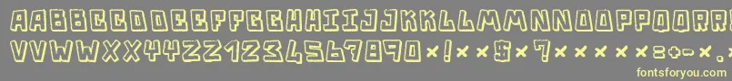 Trouble Font – Yellow Fonts on Gray Background