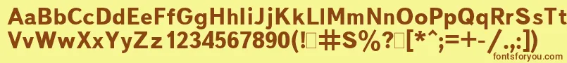 フォントBukvarnayaBold – 茶色の文字が黄色の背景にあります。