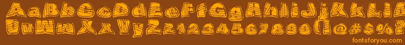 OverrideDsg-Schriftart – Orangefarbene Schriften auf braunem Hintergrund