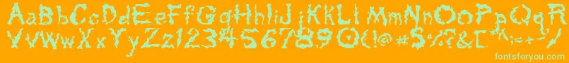 Tarpits-Schriftart – Grüne Schriften auf orangefarbenem Hintergrund
