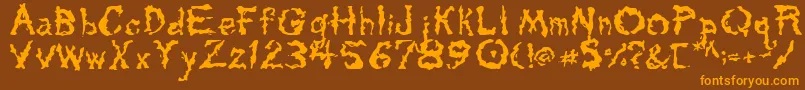 Tarpits-fontti – oranssit fontit ruskealla taustalla