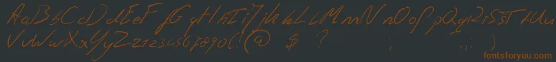 Fonte Jaspershandwriting – fontes marrons em um fundo preto