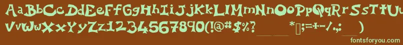 フォントYoEllipse – 緑色の文字が茶色の背景にあります。