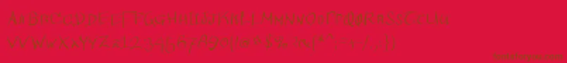 Wacomian-Schriftart – Braune Schriften auf rotem Hintergrund