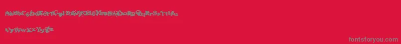 Fantasymachine Font – Gray Fonts on Red Background