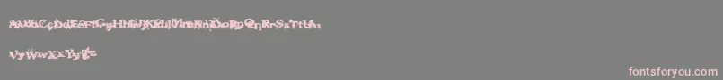 Fantasymachine-Schriftart – Rosa Schriften auf grauem Hintergrund