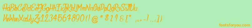 DeadlyInked-Schriftart – Orangefarbene Schriften auf grünem Hintergrund