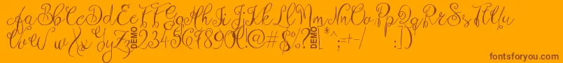 ZenythScriptDemo-Schriftart – Braune Schriften auf orangefarbenem Hintergrund