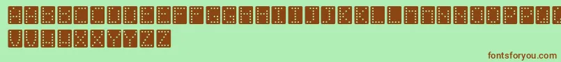 Domino-fontti – ruskeat fontit vihreällä taustalla