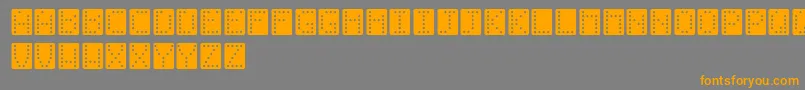 Czcionka Domino – pomarańczowe czcionki na szarym tle