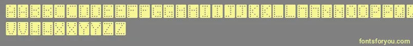 Domino Font – Yellow Fonts on Gray Background
