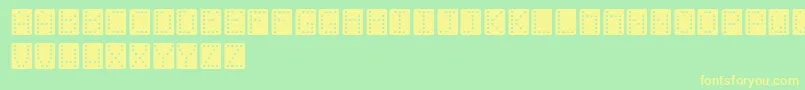 Domino-fontti – keltaiset fontit vihreällä taustalla