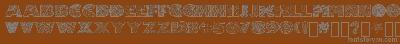 Zenfyrkalt Font – Gray Fonts on Brown Background