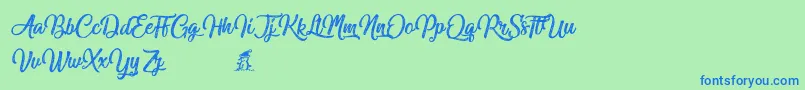Miraculouschristmas-Schriftart – Blaue Schriften auf grünem Hintergrund