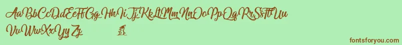 Miraculouschristmas Font – Brown Fonts on Green Background