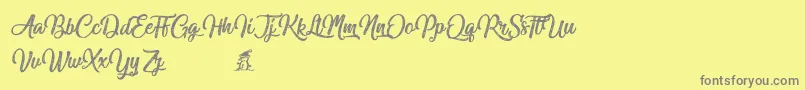 Miraculouschristmas Font – Gray Fonts on Yellow Background