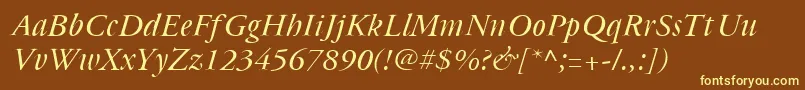Cyrillicgaramonditalic-fontti – keltaiset fontit ruskealla taustalla