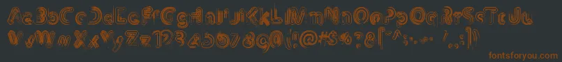 Th3Machine Font – Brown Fonts on Black Background