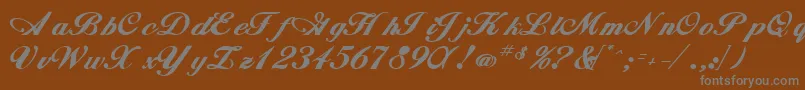 Whimsiscriptssk ffy-fontti – harmaat kirjasimet ruskealla taustalla
