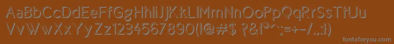 Cicle Shadow-Schriftart – Graue Schriften auf braunem Hintergrund