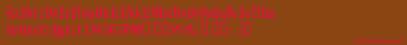 Alaricssk Font – Red Fonts on Brown Background