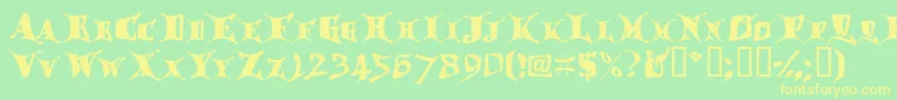 フォントDragglet – 黄色の文字が緑の背景にあります