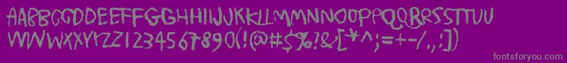 TrashMoreTrash-fontti – harmaat kirjasimet violetilla taustalla