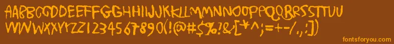 TrashMoreTrash Font – Orange Fonts on Brown Background