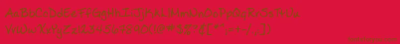 Ladylike-Schriftart – Braune Schriften auf rotem Hintergrund