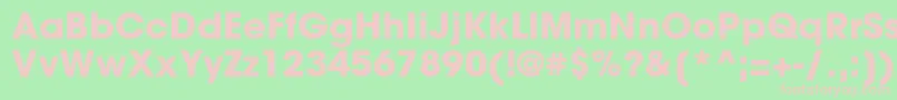 ItcAvantGardeGothicLtBold-fontti – vaaleanpunaiset fontit vihreällä taustalla