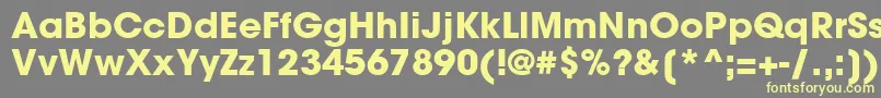 ItcAvantGardeGothicLtBold-Schriftart – Gelbe Schriften auf grauem Hintergrund