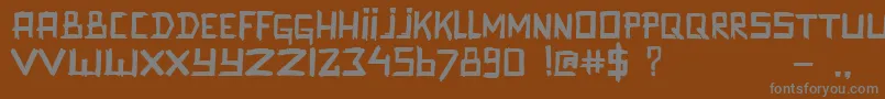 Шрифт Promenadenmischung – серые шрифты на коричневом фоне