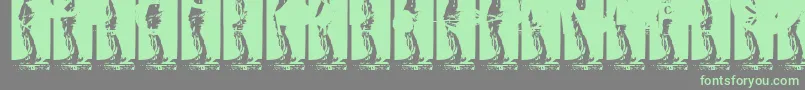 Kinkyv-Schriftart – Grüne Schriften auf grauem Hintergrund
