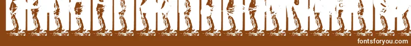 Fonte Kinkyv – fontes brancas em um fundo marrom