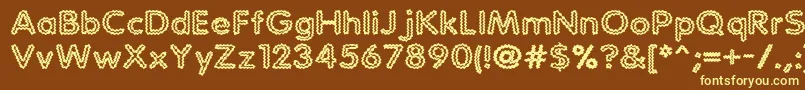 StaticCharge-fontti – keltaiset fontit ruskealla taustalla