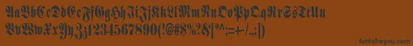 SchmalfetteFraktur Font – Black Fonts on Brown Background