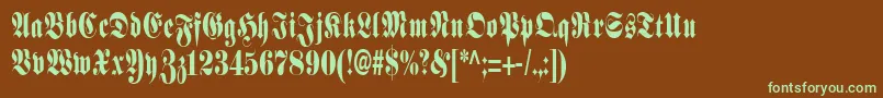 フォントSchmalfetteFraktur – 緑色の文字が茶色の背景にあります。