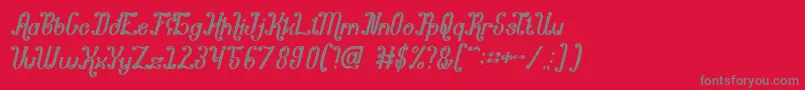 フォントPondokRatuIntan – 赤い背景に灰色の文字