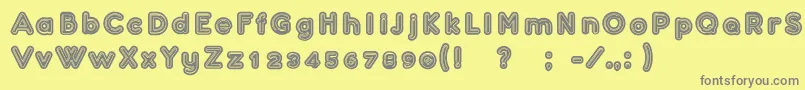 フォントConfarreatio – 黄色の背景に灰色の文字