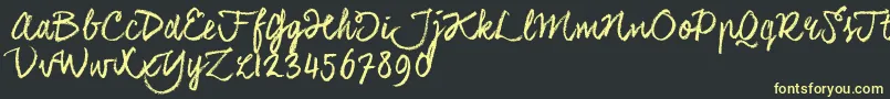 CoalhandlukeTrial Font – Yellow Fonts on Black Background