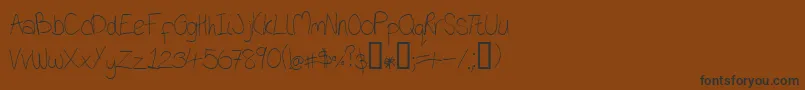 Czcionka Oniob – czarne czcionki na brązowym tle