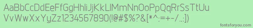 NorpethMedium-fontti – harmaat kirjasimet vihreällä taustalla