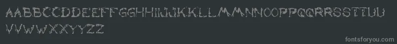 Fonte TheLazyDog – fontes cinzas em um fundo preto