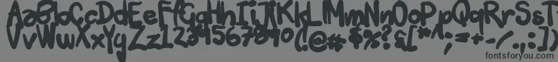 フォントTuschtouch3 – 黒い文字の灰色の背景
