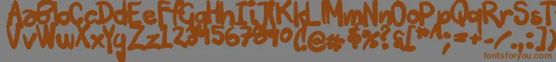 Tuschtouch3-Schriftart – Braune Schriften auf grauem Hintergrund