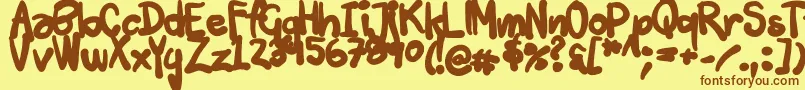 Tuschtouch3-Schriftart – Braune Schriften auf gelbem Hintergrund