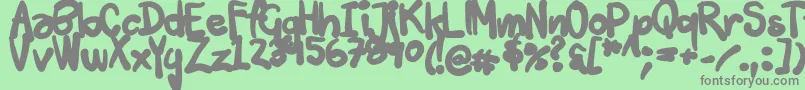 Tuschtouch3-Schriftart – Graue Schriften auf grünem Hintergrund